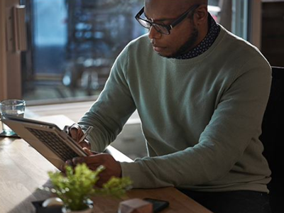 Man using Windows 11 laptop